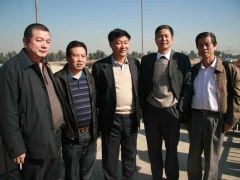 张祥茂会长、北京房山区种植业服务中心主任杨建坡、常务副会长陆解人在示范园合影   摄影：徐泽群